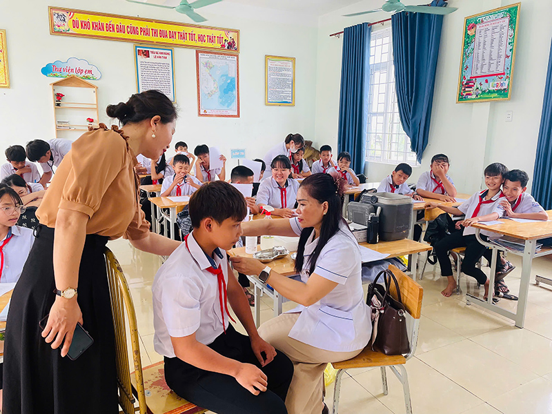 Một điểm tiêm chủng tại địa bàn huyện Bố Trạch.